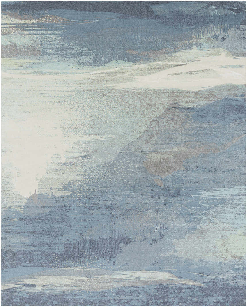 Close-up of the Alvaton Abstract Blue Rug. Features a blend of blue, denim, gray, and beige hues in a contemporary abstract design. Design-Rectangle-810