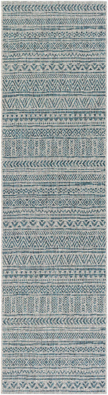 Close-up of the Novato Aqua rug featuring an all-over geometric pattern in aqua, black, taupe, and white. Design-Runner-2710