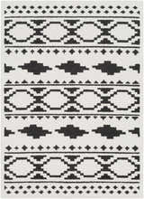 Amoret Area Rug, close-up. Black and off-white geometric pattern. Bohemian style. Design-Rectangle-5373