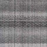 Close-up of the hand-loomed Yong Gray Rug. Features a textured, charcoal and light slate woven design. Swatch