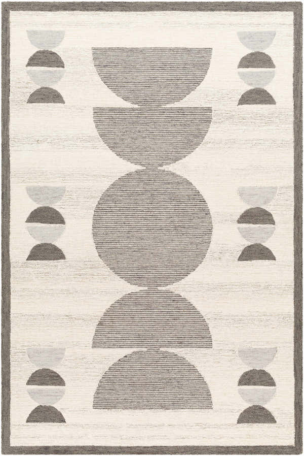 Close-up of the Anahi Area Rug. Hand-tufted wool rug with geometric gray and beige circle design. Contemporary style. Design-Rectangle-576
