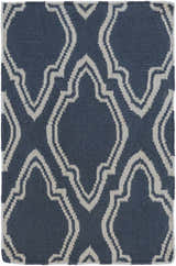 Close-up of the Anchorage Area Carpet, a hand-woven wool rug in cream and dark blue with a contemporary geometric pattern. Design-Rectangle-23
