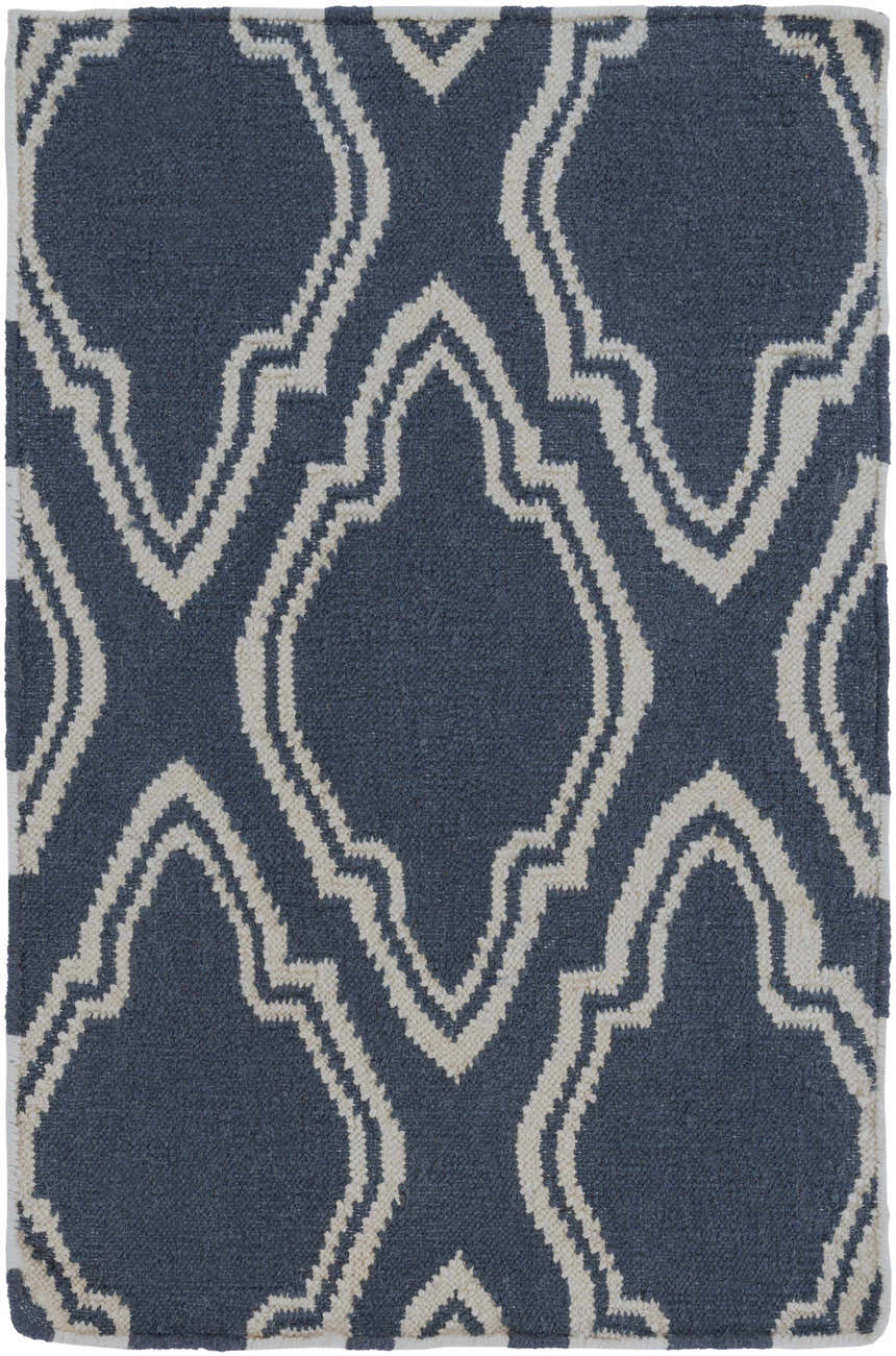 Close-up of the Anchorage Area Carpet, a hand-woven wool rug in cream and dark blue with a contemporary geometric pattern. Design-Rectangle-23