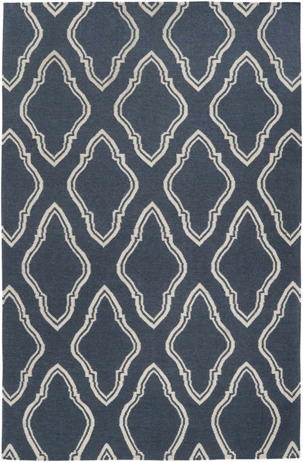 Close-up of the hand woven Anchorage Area Carpet. Cream geometric pattern on a dark blue 100% wool rug. Design-Rectangle-58