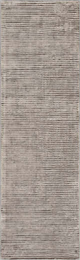 Close-up of the Angie Area Rug. Charcoal rug with a subtle striped pattern and soft, viscose texture. Design-Runner-268