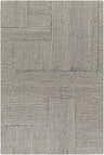 Close-up of the hand-tufted Anika Area Rug. Light gray and natural gray 100% wool rug with a farmhouse-style geometric pattern. Design-Rectangle-576