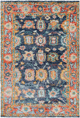 Close-up of the hand-knotted Ankara Premium Wool Area Rug. Bohemian style with navy, coral, aqua, and mustard floral pattern. Design-Rectangle-69