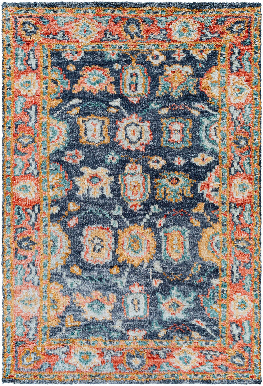 Close-up of the hand-knotted Ankara Premium Wool Area Rug. Bohemian style with navy, coral, aqua, and mustard floral pattern. Design-Rectangle-69