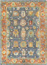 Close-up of the Ankara Premium Wool Area Rug, featuring a traditional design in aqua, orange, and navy. Hand-knotted texture. Design-Rectangle-912