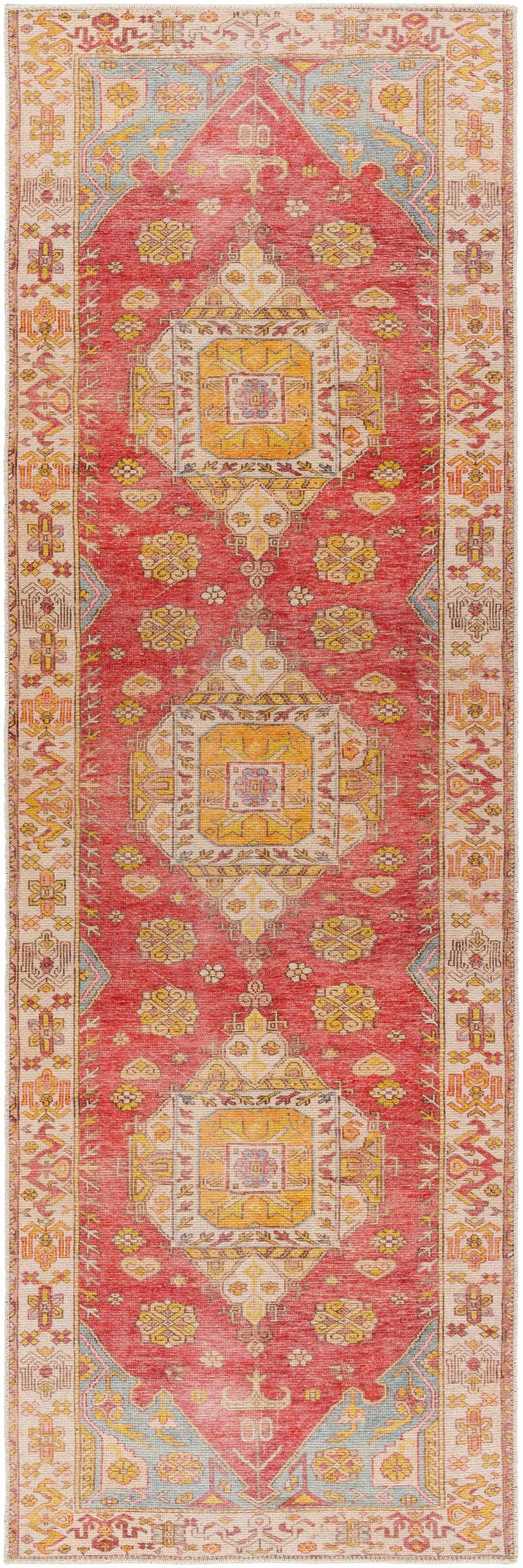 Close-up of the Anopog Washable Area Rug. Red, yellow, and cream traditional runner rug with a distressed, farmhouse style. Design-Runner-27710