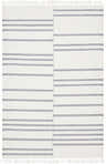 Close-up of the Aras Area Rug: a hand-woven, off-white rug with thin, dark gray stripes and knotted fringe. Design-Rectangle-576