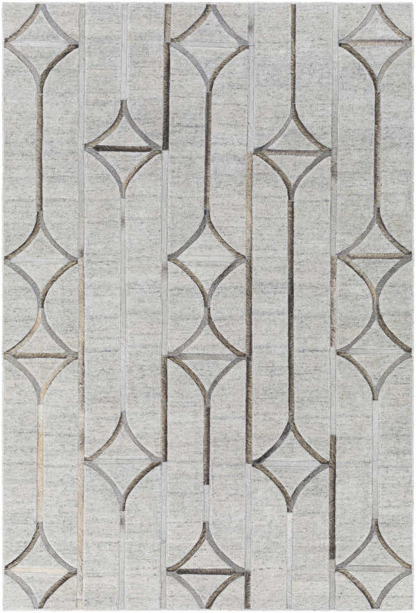 Close-up of the Ardahan Area Rug. Oatmeal rug with a geometric diamond and line pattern in brown and gray. Hand-crafted texture. Design-Rectangle-576