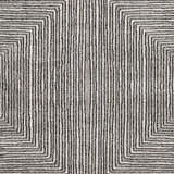 Close-up of the Artois Area Rug. Black, cream, and gray rug with a modern geometric pattern and textured jute weave. Swatch