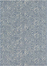 Close-up of the Ashcamp Area Rug, featuring a blue and taupe chevron pattern and textured weave. Coastal style. Design-Rectangle-5376