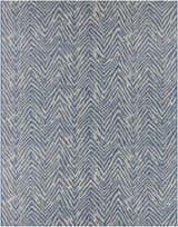 Close-up of the Ashcamp Area Rug. Coastal style rug with a blue and taupe chevron pattern. Contemporary design. Design-Rectangle-710103