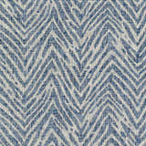 Close-up of the Ashcamp Area Rug. Coastal style rug with a blue and taupe chevron pattern and textured weave. Swatch