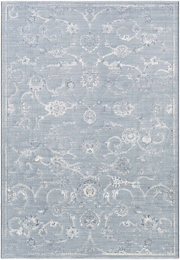 Close-up of the Astatula Area Rug. Blue rug with ice blue, ivory, and light gray traditional floral pattern. Design-Rectangle-5376