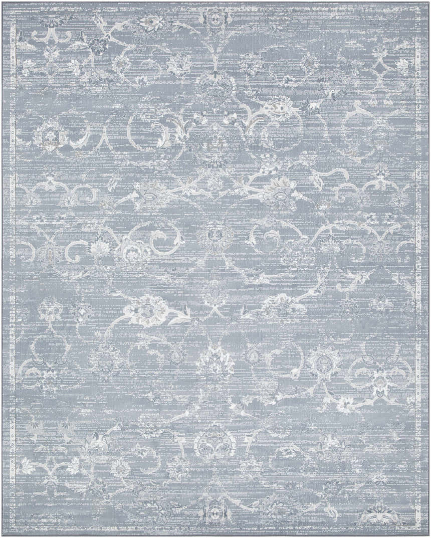 Close-up of the Astatula Area Rug. Bohemian style rug in blue, ice blue, ivory and light gray with a traditional floral pattern. Design-Rectangle-71010