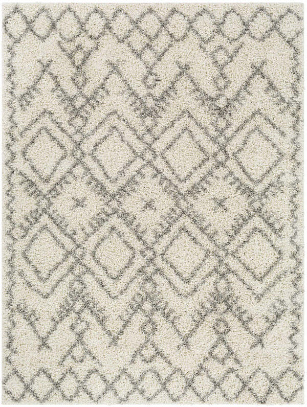 Close-up of the Atascadero Area Carpet: a cream shag rug with a gray geometric diamond pattern. Bohemian style. Design-Rectangle-527