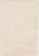 Close-up of the Atlas Carpet in beige. Hand-knotted rug with a subtle horizontal line pattern. Farmhouse style. Design-Rectangle-576