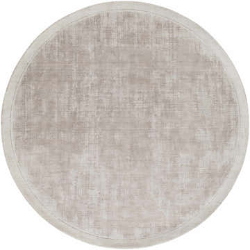 Close-up of round Auchter Soli Taupe rug. Premium sheer carpet with subtle texture and medium gray tones. Design-Round-59