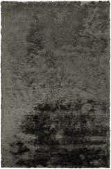 Close-up of the hand-woven Auxier Area Rug. Ink blue and teal shag rug with a soft, textured design. Design-Rectangle-58