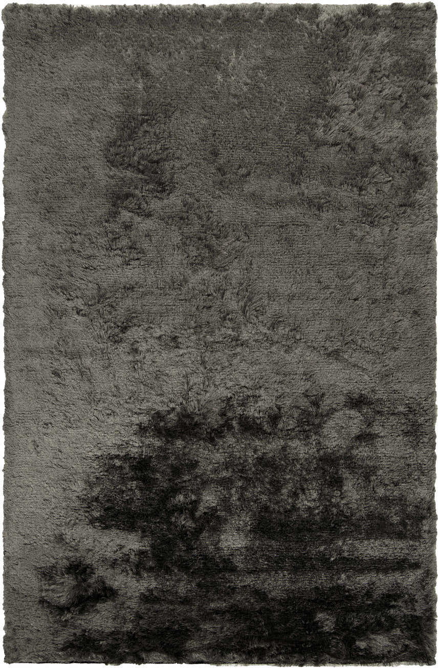 Close-up of the hand-woven Auxier Area Rug. Ink blue and teal shag rug with a soft, textured design. Design-Rectangle-58