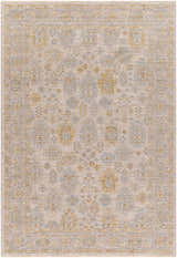 Close-up of the Ayele Thick Luxe Statement Rug, featuring a traditional design in charcoal, mustard, and gray tones. Design-Rectangle-575