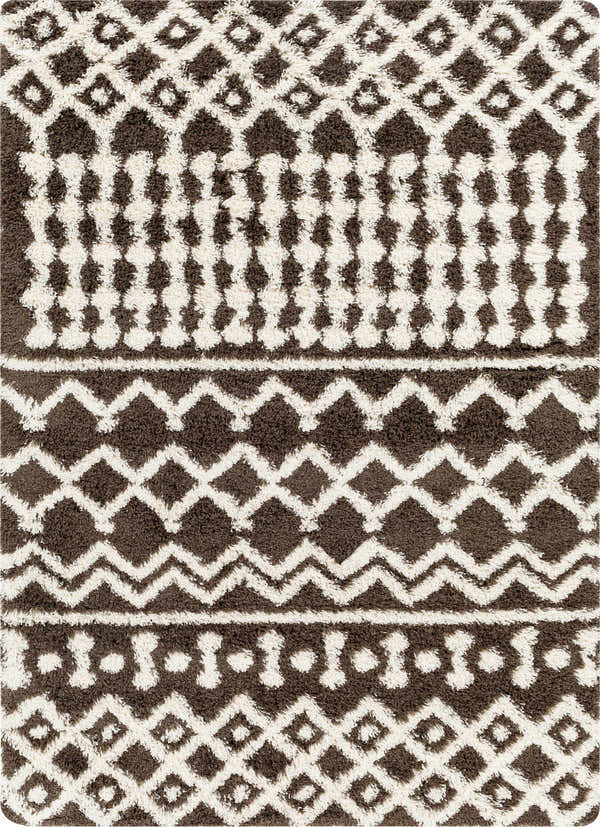 Close-up of the Aysel Shag Area Rug; a geometric shag rug in bone and dark brown. Farmhouse style with a soft, plush texture. Design-Rectangle-5373
