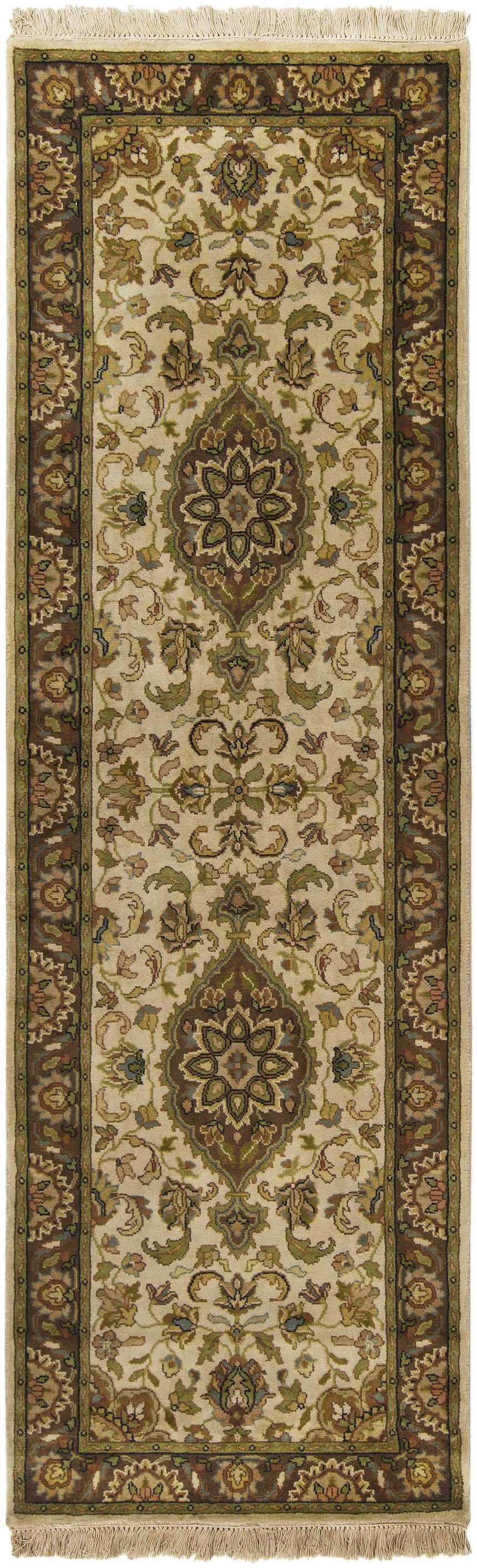 Close-up of Azalia Premium Wool Rug. Beige rug with traditional floral and geometric patterns in brown, sage, and green. Hand-knotted texture. Design-Runner-268