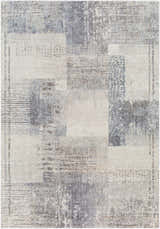 Close-up of the Bacca Area Rug showing its gray, light gray, and nutmeg contemporary block pattern. Design-Rectangle-5373