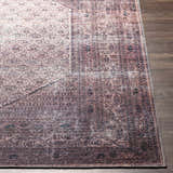 Close-up of the Dusty Pink Bagacay Distressed Washable Area Rug showing its oriental pattern and soft texture. Front