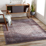Living room with a Dusty Pink Bagacay Distressed Washable Area Rug, wood floors, mid-century modern chair and console table. Roomscene-Rectangle