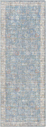Close-up of the Bagontapay Washable Area Rug. Blue, cream, and light brown oriental rug with a traditional floral pattern. Design-Runner-2773