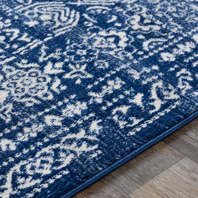 Michie Dark Blue Area Rug - Clearance