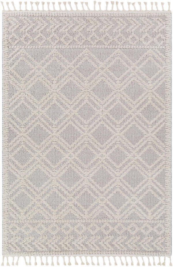 Close-up of Bansalan Area Rug with cream and gray diamond pattern and tasseled edges. Bohemian style. Design-Rectangle-537
