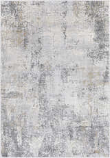 Close-up of the Baranduda Abstract Gray Luxe Rug, featuring charcoal, blue, beige, and yellow distressed pattern. Design-Rectangle-573
