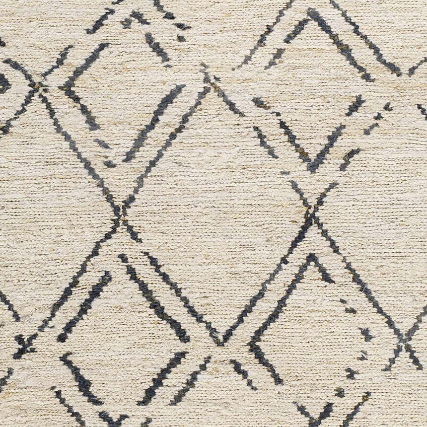 Close-up of the Barlig Beige Trellis Jute Carpet showing its hand-woven texture and black geometric trellis pattern. Swatch