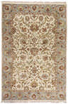 Close-up of the Baylis Area Carpet showcasing its traditional floral pattern in brick red, brown, ice blue, and beige tones. Design-Rectangle-5686