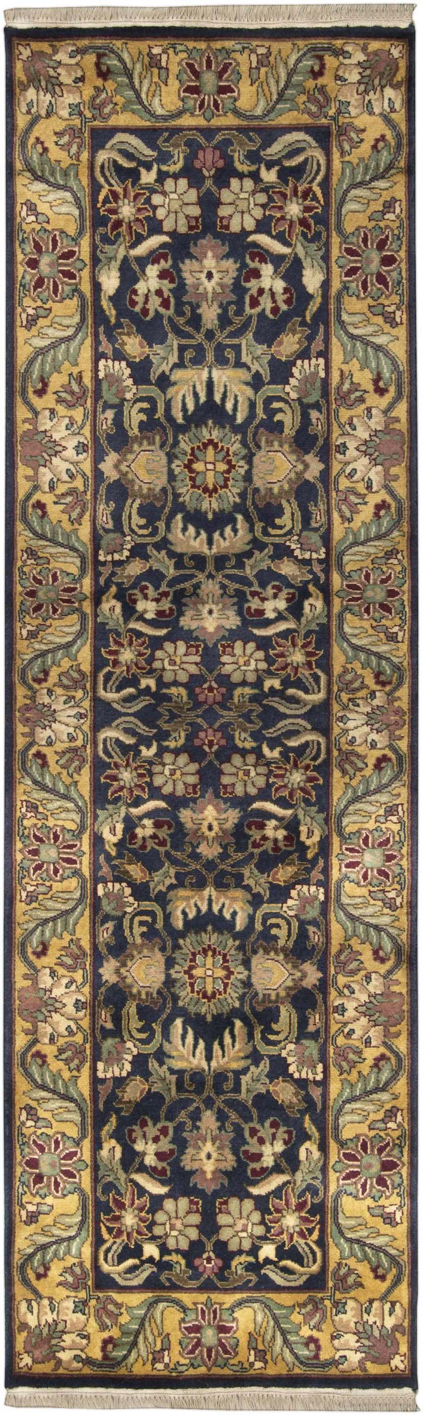 Close-up of the Bays Area Carpet runner. Features a traditional floral pattern in ink blue, amber, and brick red tones. Design-Runner-268