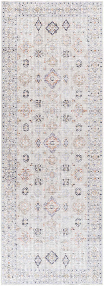 Close-up of a Beige Beckett Washable Rug. Features a traditional, vintage-inspired geometric pattern in beige, red, and blue. Design-Runner-2773