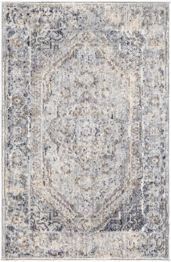 Close-up of the Beebe Luxe Machine Area Rug with a traditional, distressed design in ivory, gray, brown, and black tones. Design-Rectangle-23