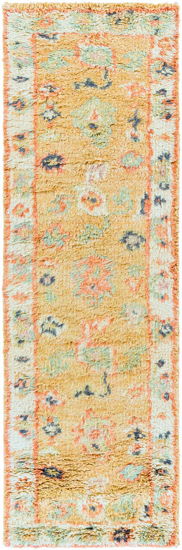 Close-up of the hand knotted Belevi Wool Rug. Features cream, tan, and pale blue hues with a textured, bohemian design. Design-Runner-268