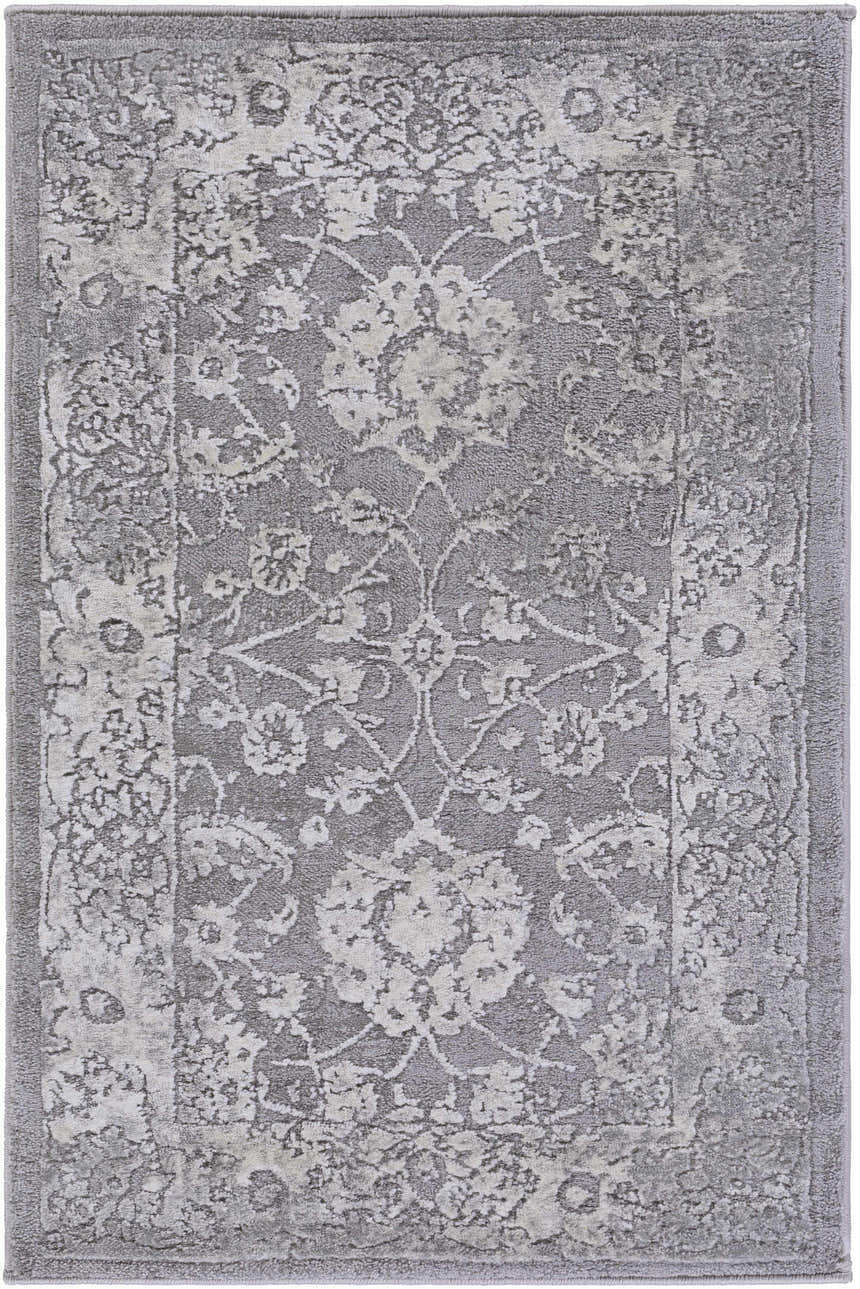 Close-up of the Benavides Gray Updated Traditional Tibetan Rug, showcasing its charcoal, gray, and ivory floral pattern. Design-Rectangle-23