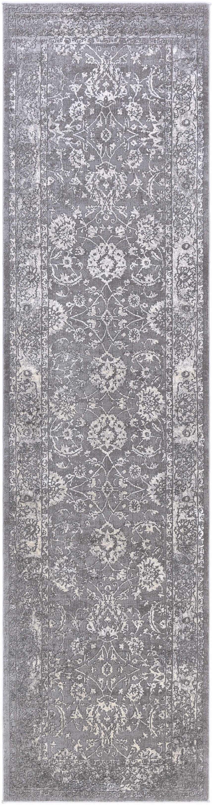 Close-up of a Benavides Gray Updated Traditional Tibetan Rug, showcasing its charcoal, gray, and ivory floral pattern and soft texture. Design-Runner-2710
