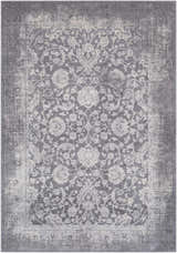 Close-up of the Benavides Gray Updated Traditional Tibetan Rug featuring a floral pattern in charcoal, gray, and ivory hues. Design-Rectangle-537