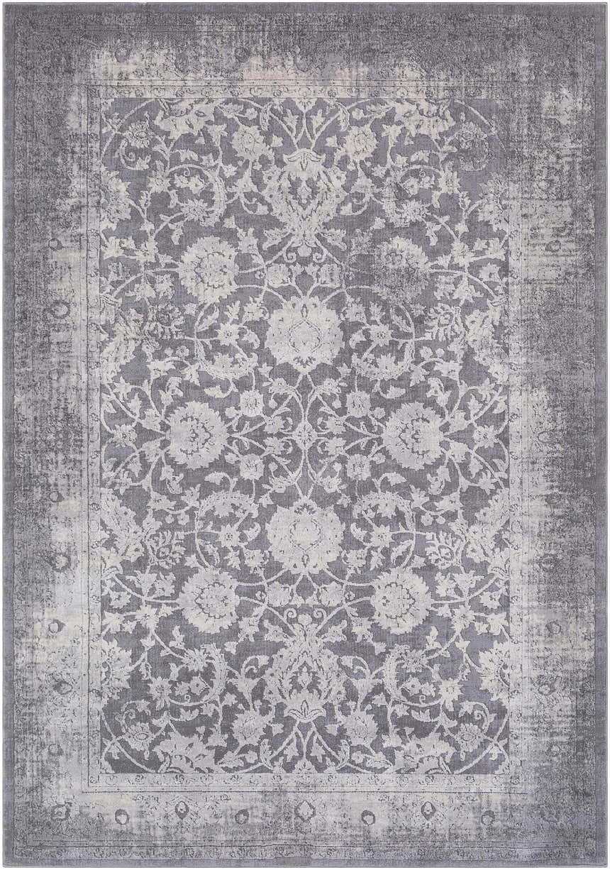 Close-up of the Benavides Gray Updated Traditional Tibetan Rug featuring a floral pattern in charcoal, gray, and ivory hues. Design-Rectangle-537