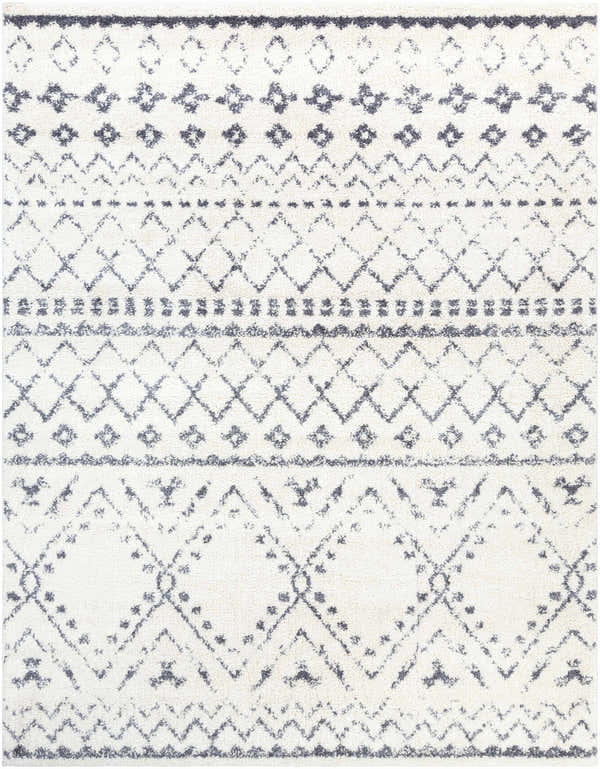 Close-up of the Benezett Area Rug, a white shag rug with a gray bohemian-inspired geometric pattern. Design-Rectangle-710103