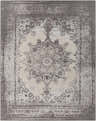 Close-up of the Berserker Carpet, a hand-woven rug with a traditional oriental pattern in charcoal, light beige, and light gray. Design-Rectangle-810