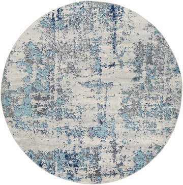 Close-up of round Beverly Abstract Blue Area Rug. Features aqua, charcoal, dark blue, light slate, and white abstract pattern. Design-Round-710